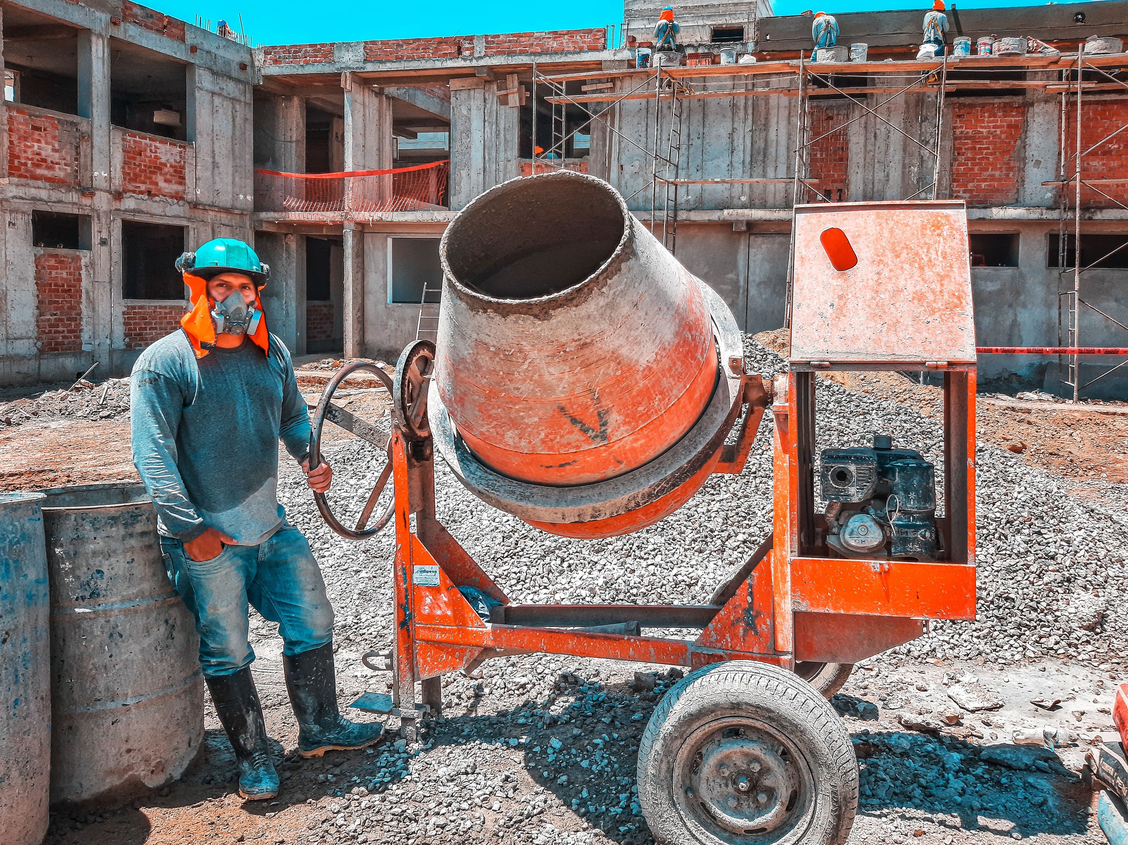 Large-scale construction site with workers, cranes, and infrastructure representing MOONEXT Global Solution's international workforce deployment